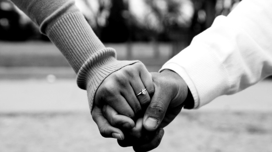 Black Couple Holding Hands N Digo